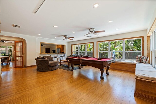 recreation room featuring ceiling fan, french doors, light wood-type flooring, and pool table