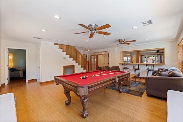 rec room with ceiling fan, light hardwood / wood-style floors, and billiards