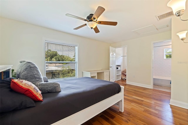 bedroom featuring hardwood / wood-style floors and ceiling fan