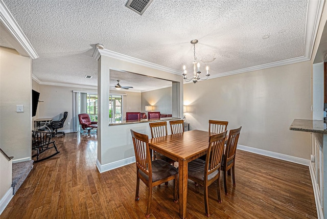 dining room with crown molding, dark hardwood / wood-style flooring, and ceiling fan with notable chandelier