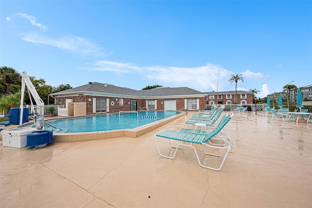 view of swimming pool featuring a patio