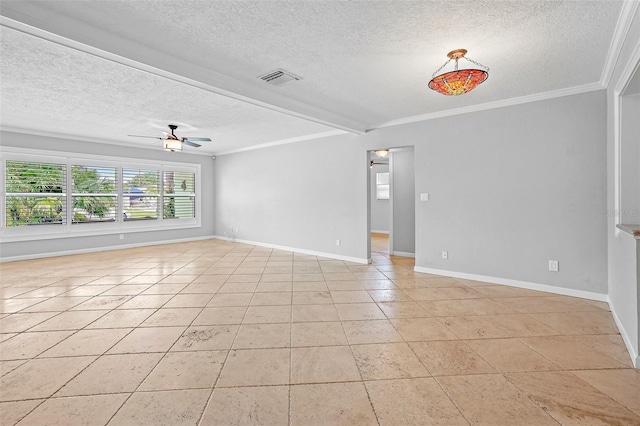 spare room featuring ceiling fan, ornamental molding, a textured ceiling, light tile patterned floors, and beam ceiling