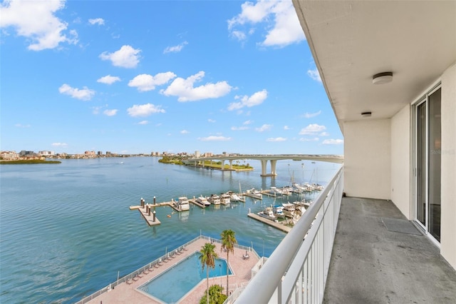 balcony featuring a water view