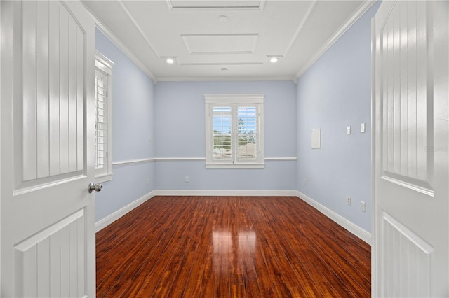 unfurnished room featuring dark hardwood / wood-style flooring and ornamental molding