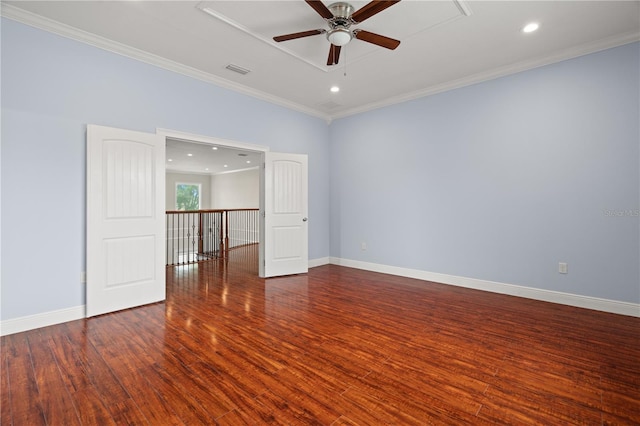 unfurnished room with dark hardwood / wood-style floors, ceiling fan, and ornamental molding