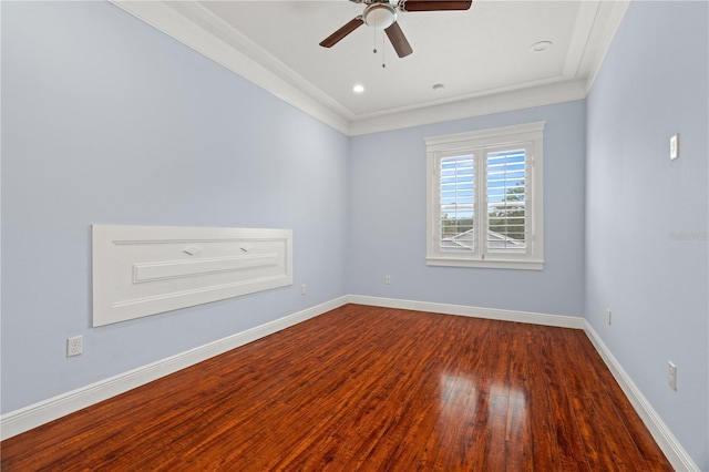 spare room featuring hardwood / wood-style flooring, ceiling fan, and ornamental molding