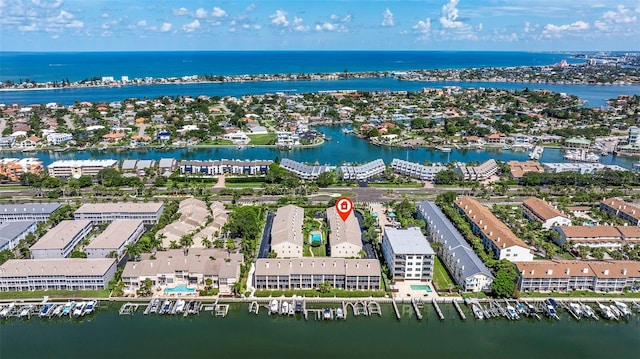 birds eye view of property featuring a water view