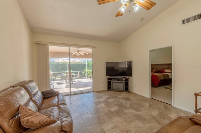 living room featuring vaulted ceiling