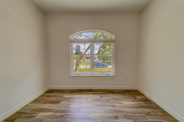 unfurnished room with a healthy amount of sunlight