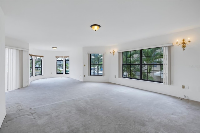 spare room featuring carpet floors