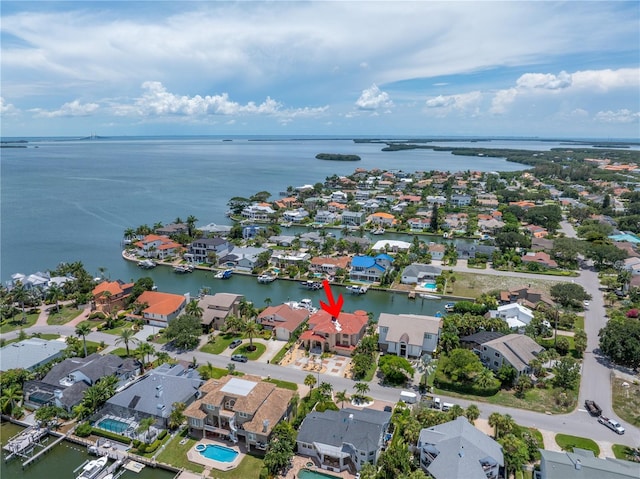 drone / aerial view with a water view