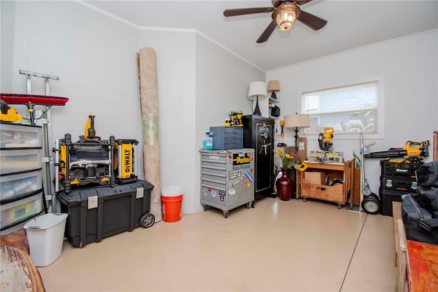 interior space with ceiling fan, ornamental molding, and concrete floors