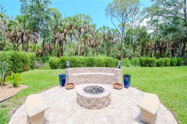 view of patio with an outdoor fire pit