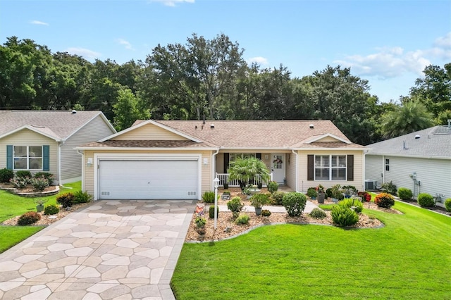 ranch-style house featuring central air condition unit, a front yard, a porch, and a garage