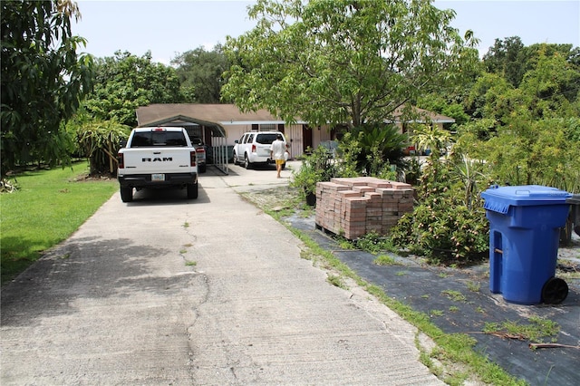 view of front of property with a carport