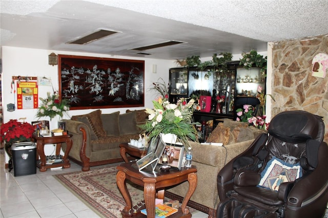 tiled living room with a textured ceiling