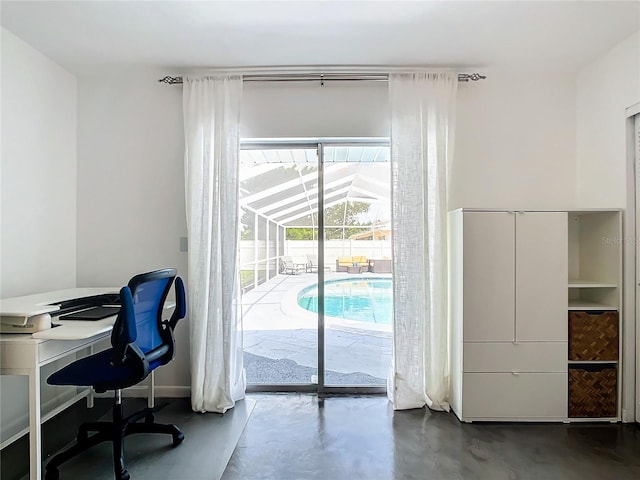 office area featuring concrete floors