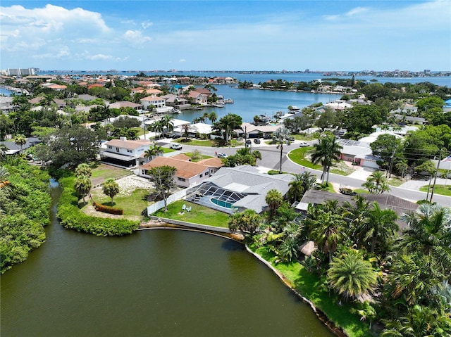 drone / aerial view with a water view