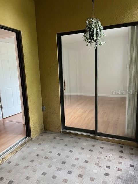 interior space with an inviting chandelier