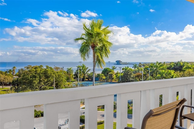 balcony featuring a water view