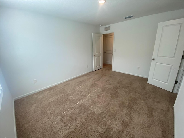 unfurnished bedroom featuring carpet floors