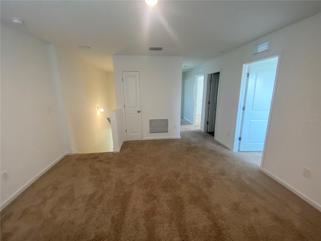 unfurnished room with carpet