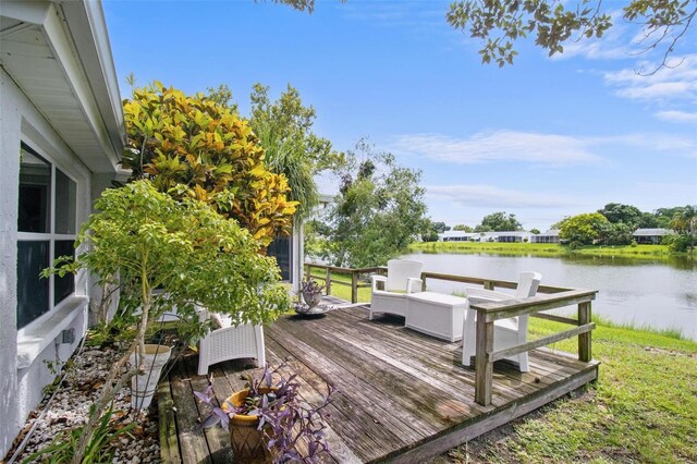 wooden terrace with a water view