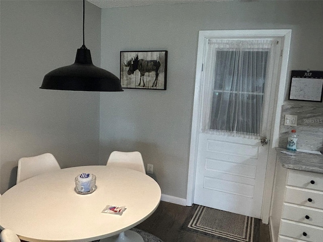 dining room featuring hardwood / wood-style flooring