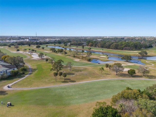 aerial view featuring view of golf course and a water view