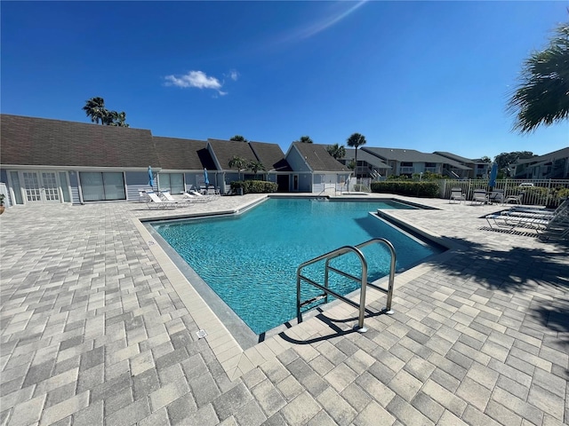 view of swimming pool featuring a patio