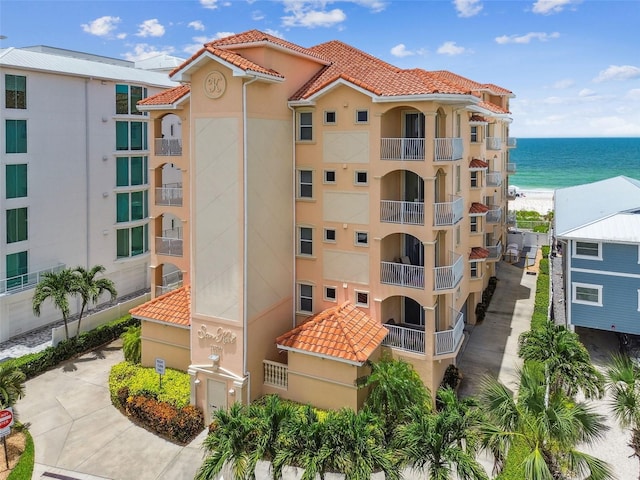 19820 Gulf Blvd Unit 401, Indian Shores, FL 33785 - view of property with a water view and a view of the beach