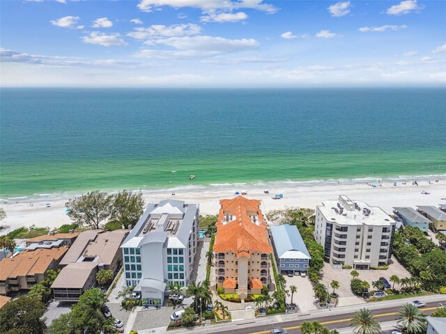 bird's eye view featuring a beach view and a water view