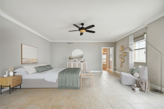 bedroom with ornamental molding, light tile patterned floors, ceiling fan, and ensuite bath