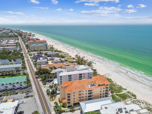 aerial view featuring a water view and a beach view