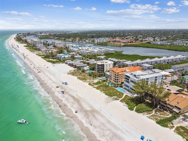 drone / aerial view with a view of the beach and a water view