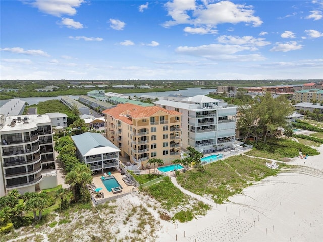 drone / aerial view with a water view