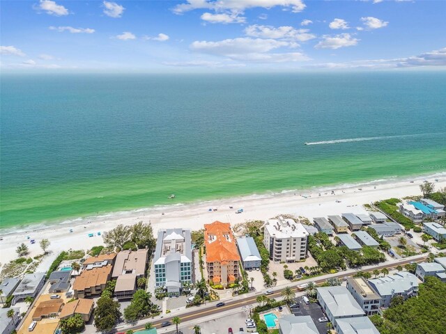 aerial view featuring a water view and a beach view