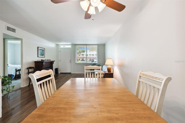 dining area featuring ceiling fan and hardwood / wood-style floors