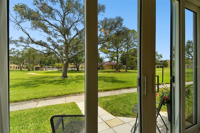 doorway to outside featuring plenty of natural light