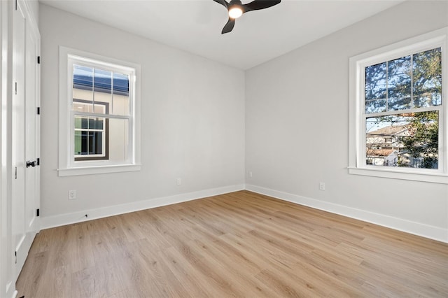 unfurnished room featuring ceiling fan and light hardwood / wood-style flooring