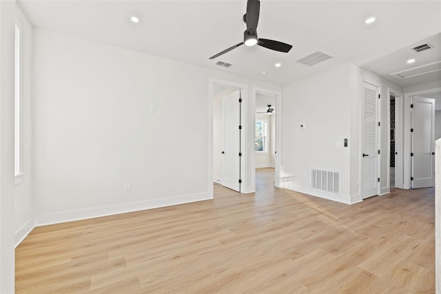 unfurnished room with ceiling fan and light hardwood / wood-style flooring