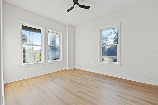 empty room featuring light hardwood / wood-style floors and ceiling fan