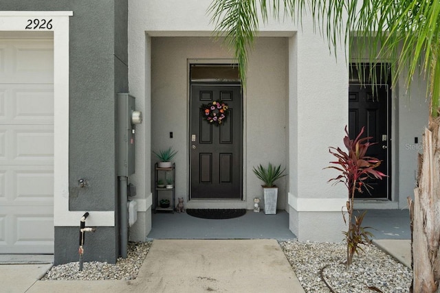 property entrance with a garage