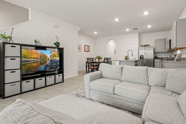 living room featuring sink