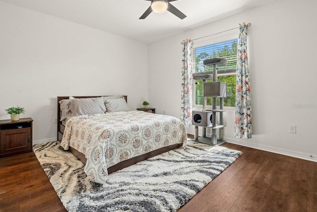 bedroom featuring dark hardwood / wood-style floors and ceiling fan