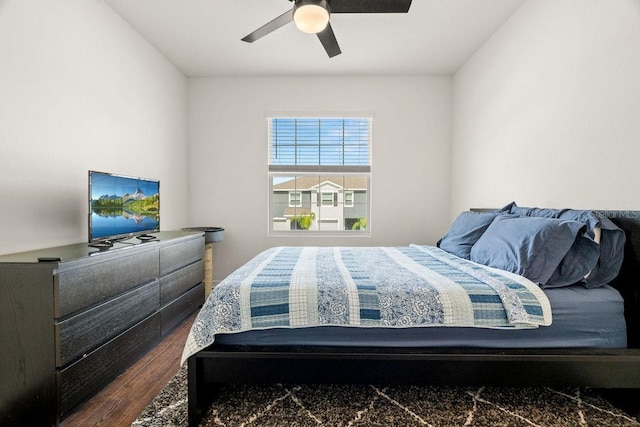 bedroom featuring wood-type flooring and ceiling fan