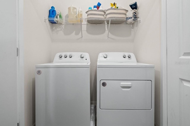 laundry room featuring independent washer and dryer