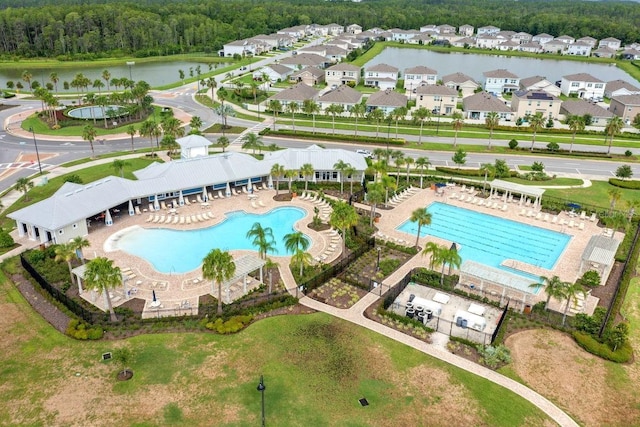 view of pool featuring a water view