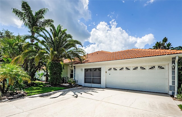 view of front of home with a garage