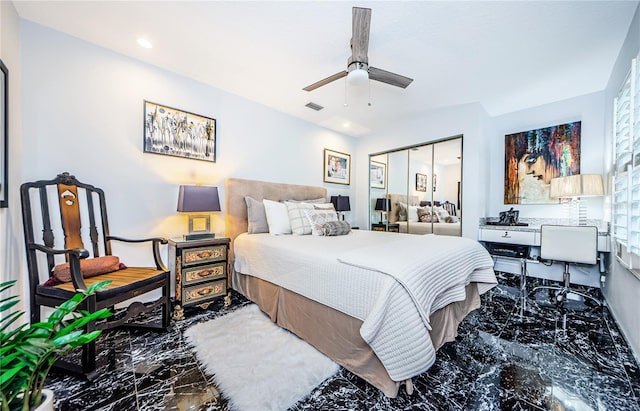 bedroom with a closet and ceiling fan